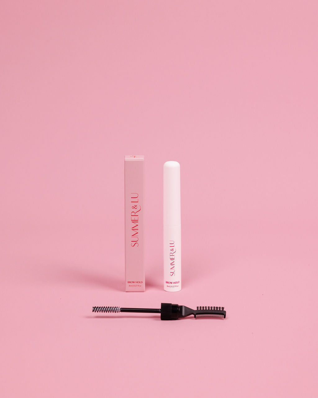 Using bristle side of Brow Hold Gel brush for sleek, laminated brow look