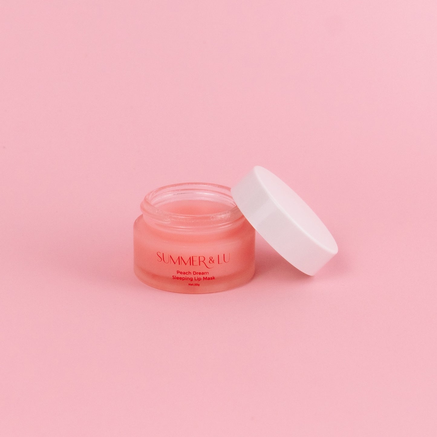 Applying Peach Lip Mask at night for soft, smooth lips by morning