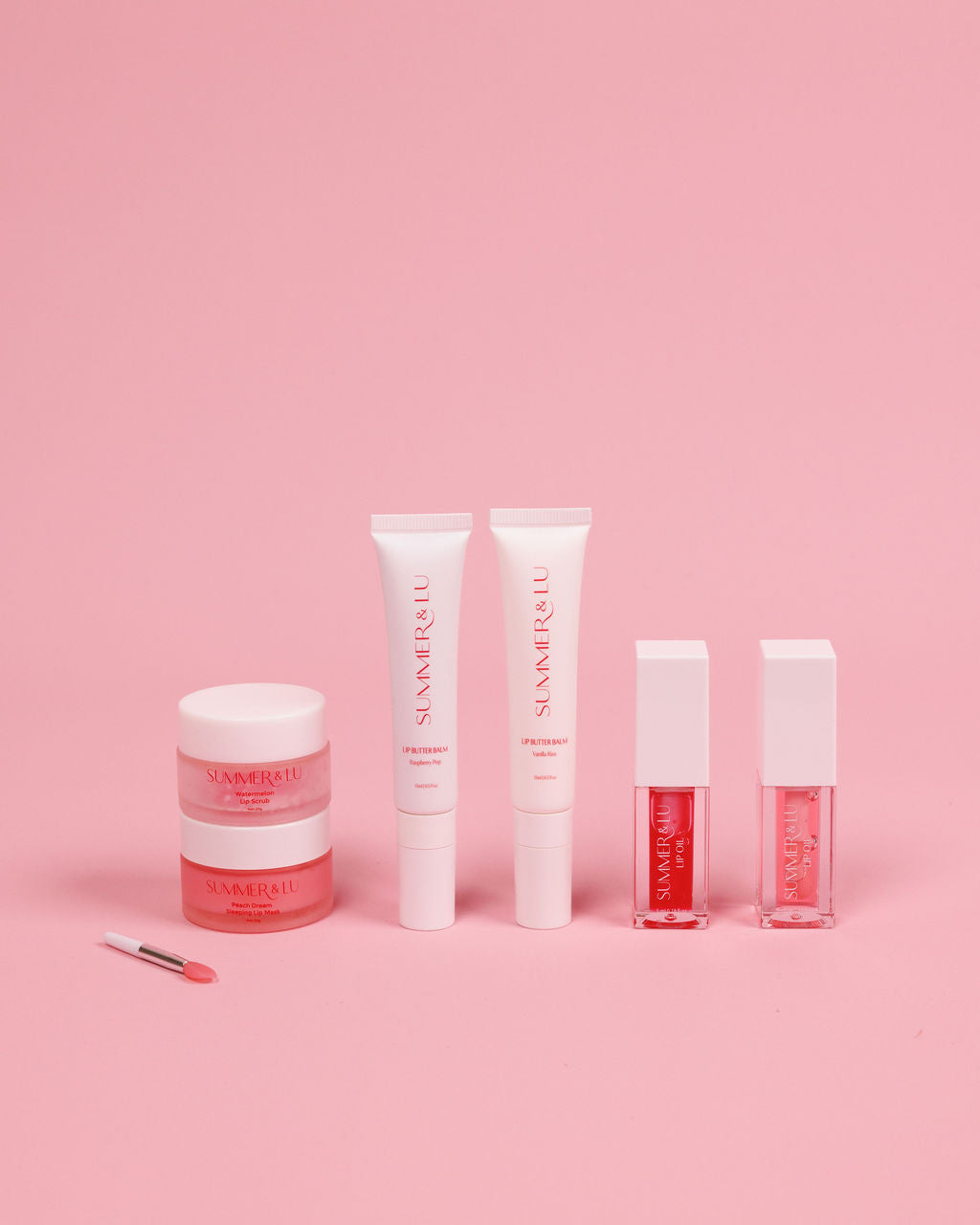 Lip Scrub from Complete Lip Care Set gently exfoliating lips for smoothness.